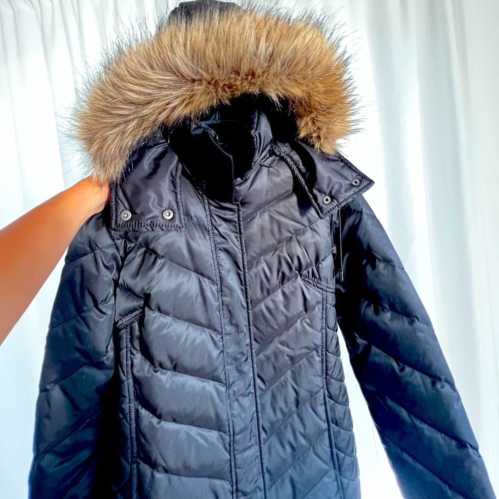 Women’s Kenneth Cole Reaction black puffy coat with detachable hood.